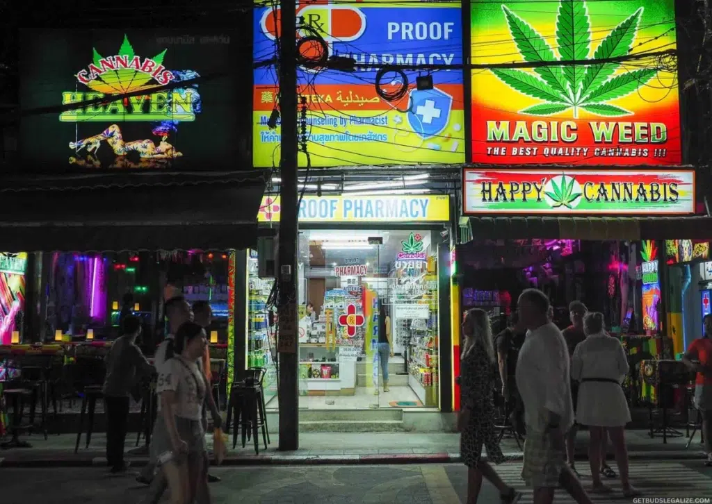 Thailand Cracks Down on Cannabis Access Following Smuggling Surge 8 Busy street in Pattaya, Thailand, with multiple cannabis dispensaries and neon signage